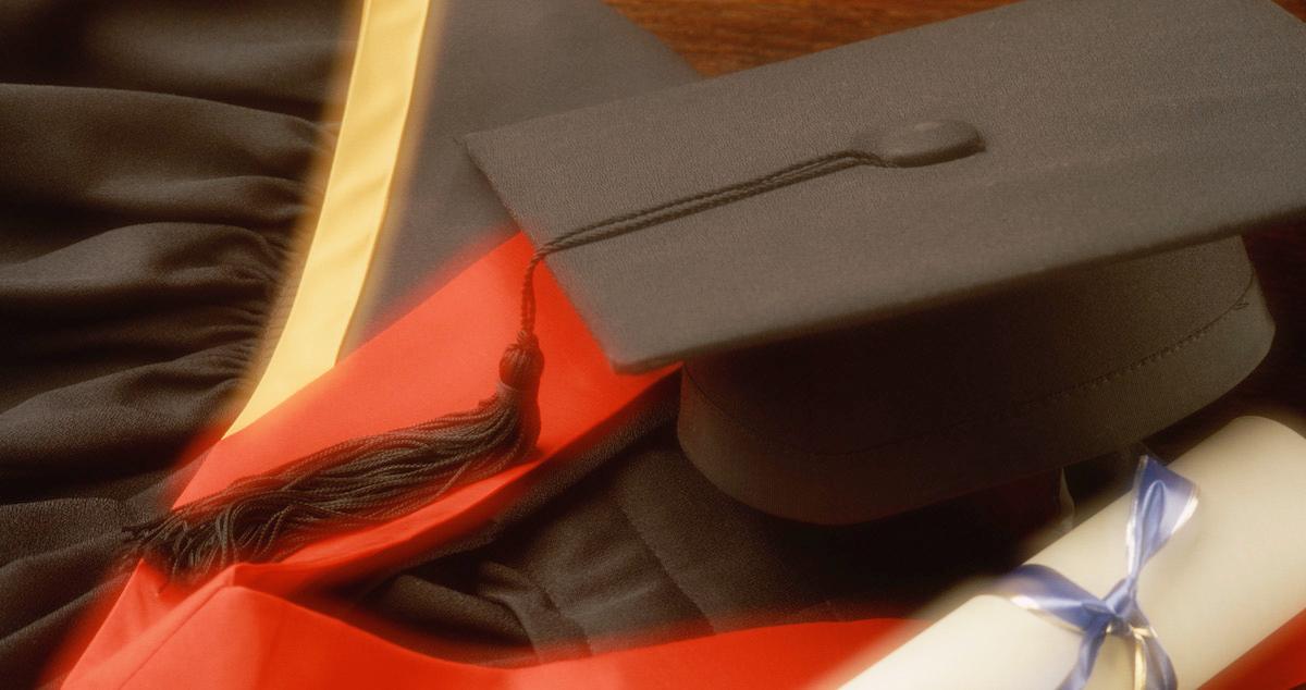 cap and gown underneath