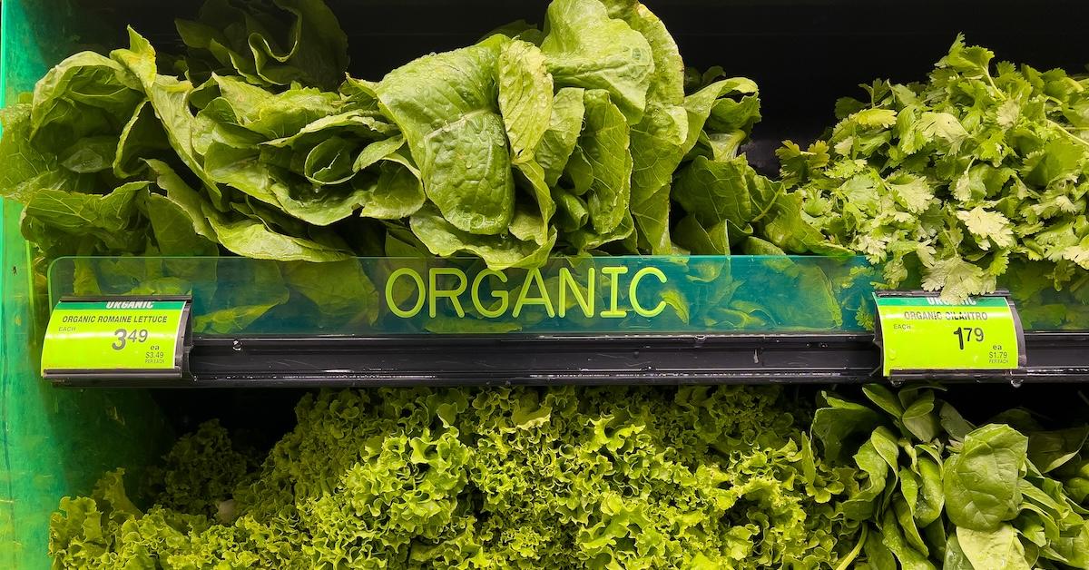 Organic greens for sale at a supermarket stock photo