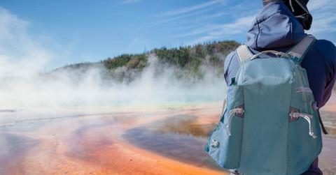 Tourist is visiting a popular hot spring in the Yellowstone National Park. (Representative Cover Image Source: Getty Images | Elena Pueyo)