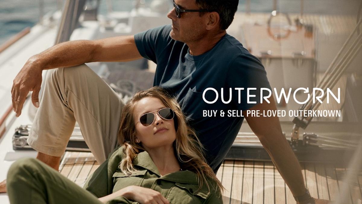 Two models on boat in Outerknown clothes