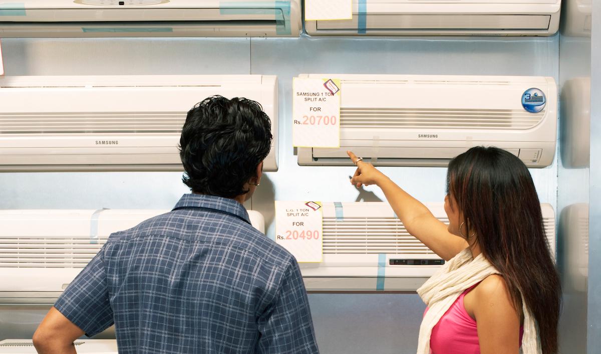 Couple choosing an air conditioner