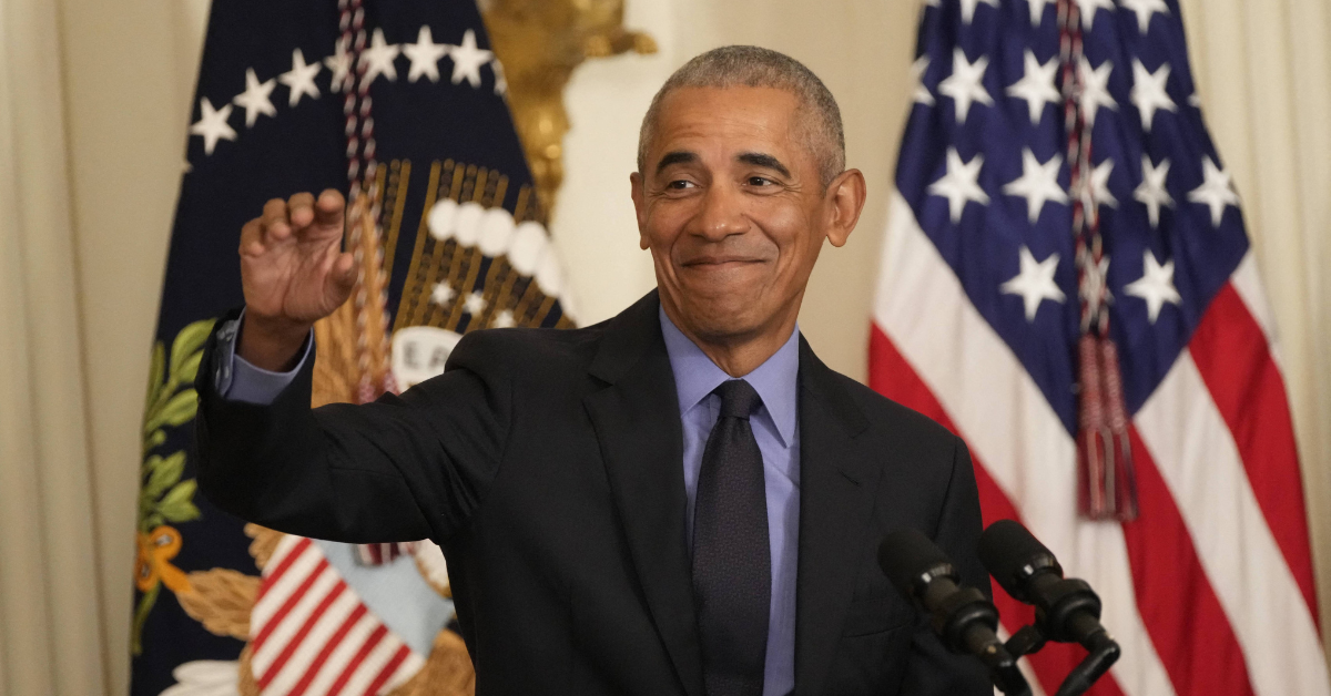 Obama addresses reporters after signing an expansion of the ACA