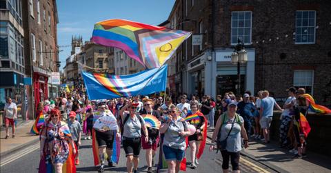 People marching during a Pride March in England.