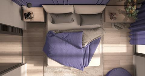 aerial view of bedroom with purple and gray decor