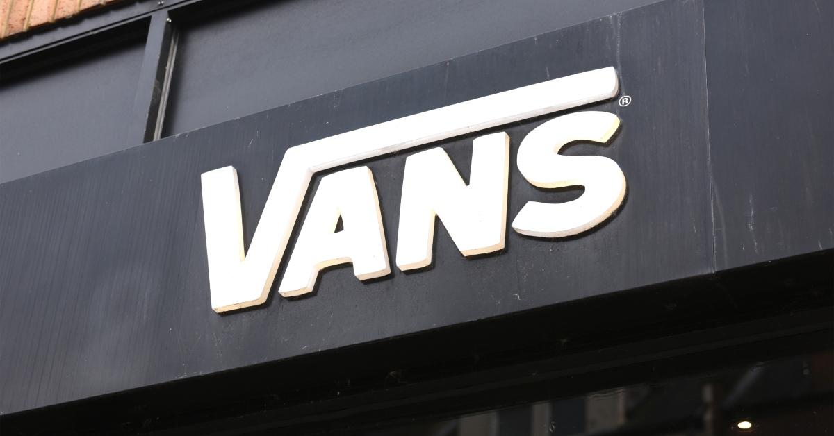 A close-up of the black and white Vans logo at a Vans storefront.  