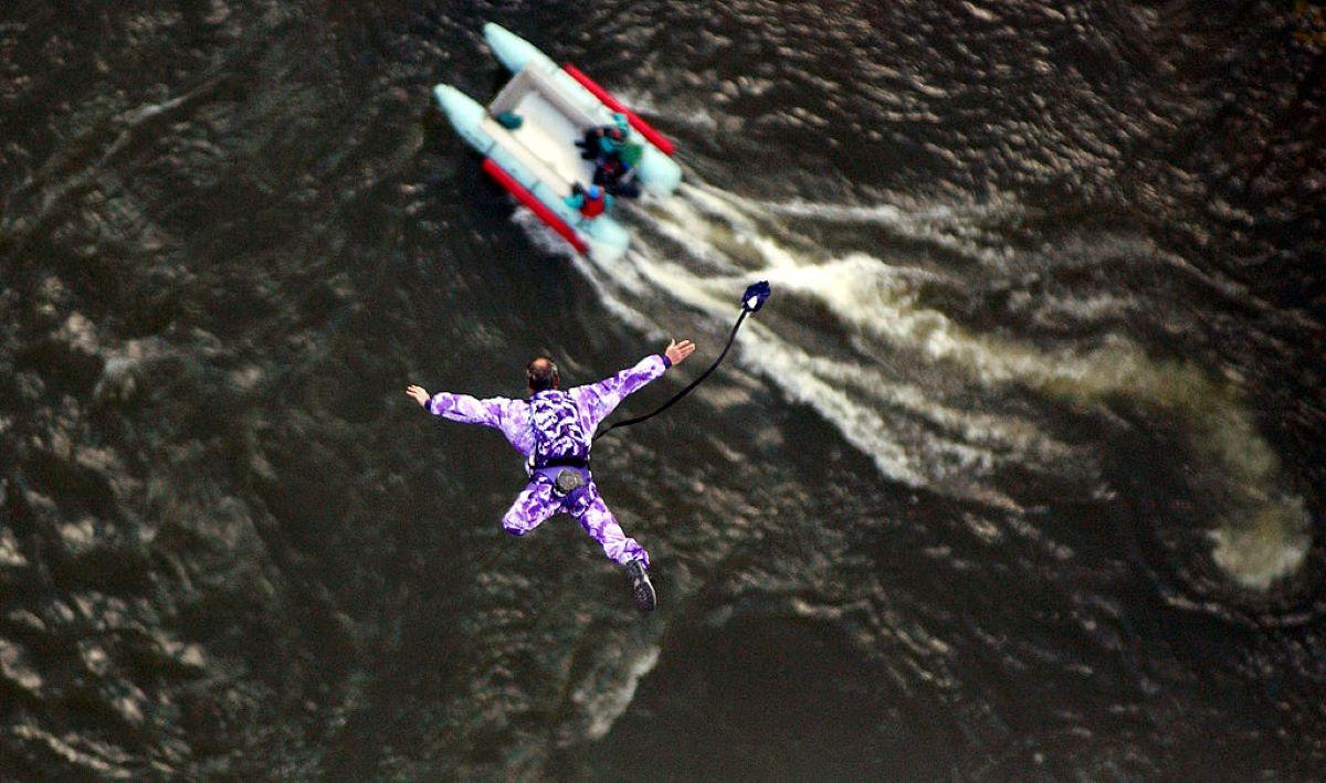 A man BASE jumps from a bridge in West Virginia