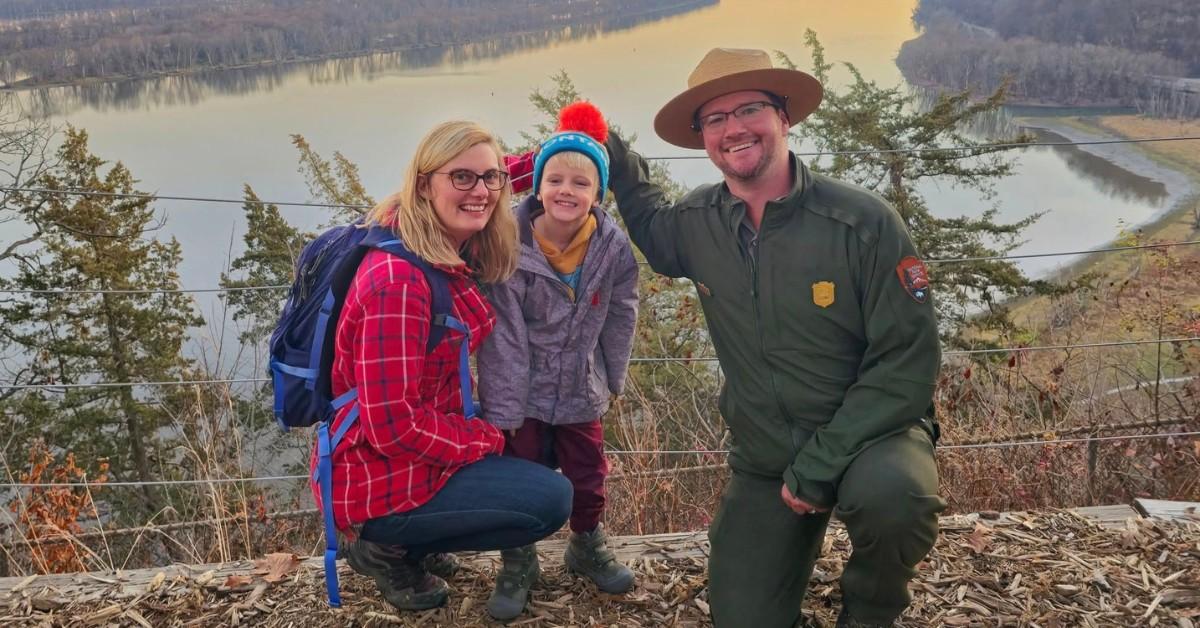 Brian Gibbs poses with his family members. 