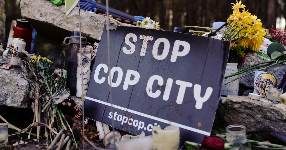 Stop Cop City protest sign at memorial.