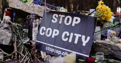 Stop Cop City protest sign at memorial.