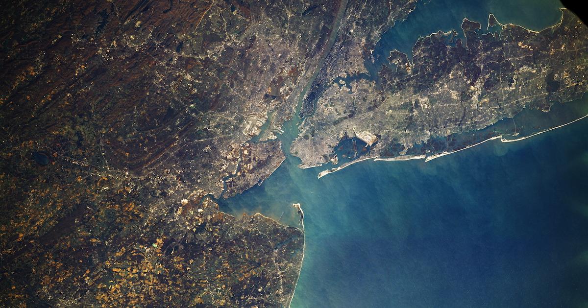 An aerial shot of the ocean on a shore