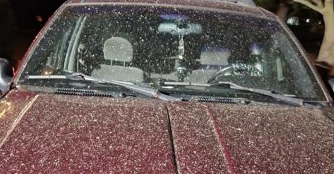 White Dust Falling From the Sky Onto Cars