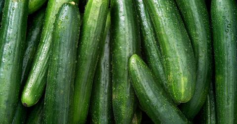Closeup of pile of cucumbers