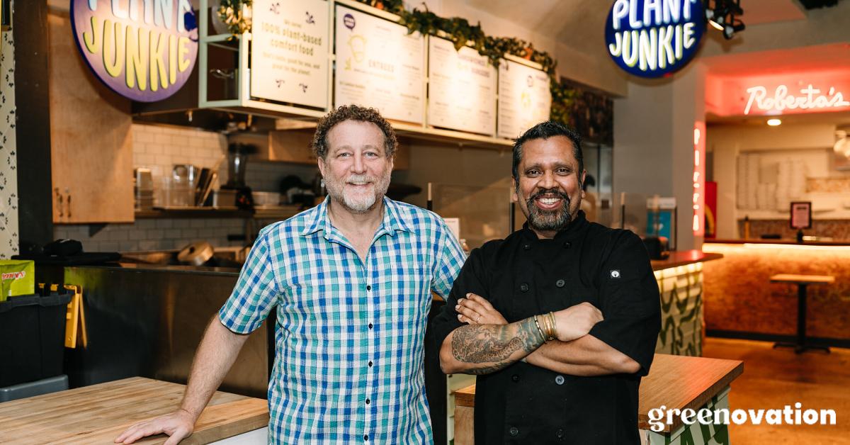 Plant Junkie CEO Nat Milner (left) and COO and Executive Chef Hiranth Jaysinghe (right) posing for a photo in the Plant Junkie restaurant
