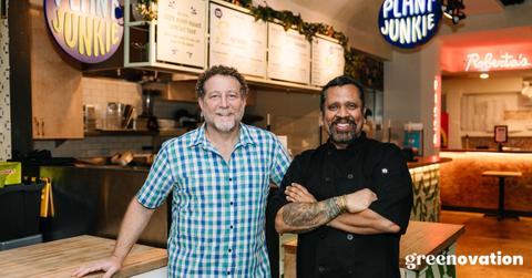 Plant Junkie CEO Nat Milner (left) and COO and Executive Chef Hiranth Jaysinghe (right) posing for a photo in the Plant Junkie restaurant