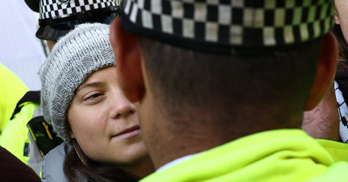 Greta Thunberg faces policeman