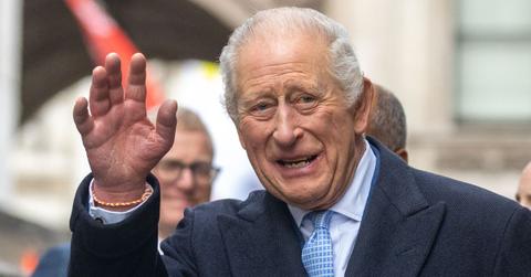 King Charles waves at the crowd