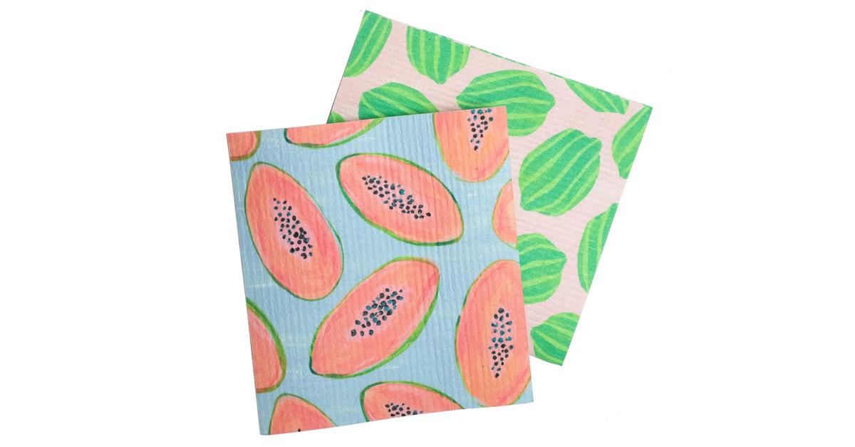 Swedish dishcloths with fruit patterns on a white background.