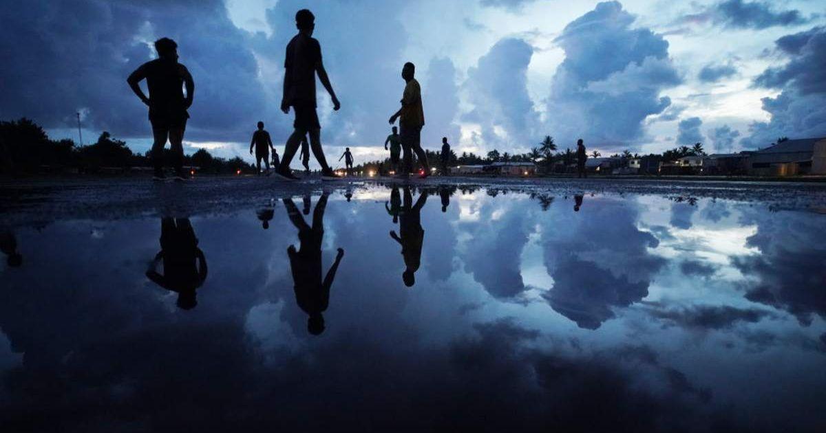 Rising sea levels in Tuvalu island cause its residents to migrate to other countries (Representative Cover Image Source: Getty Images | Mario Tama)