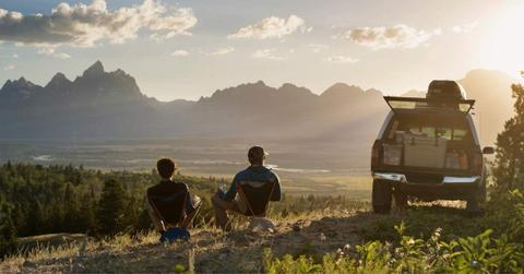 Hikers in Grand Teton National Park are enjoying the view sitting beside their camper van. (Representative Cover Image Source: Getty Images | Cavan Images)