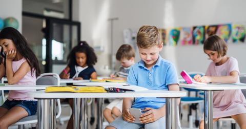 Child distracted and unable to concentrate in class with the phone.