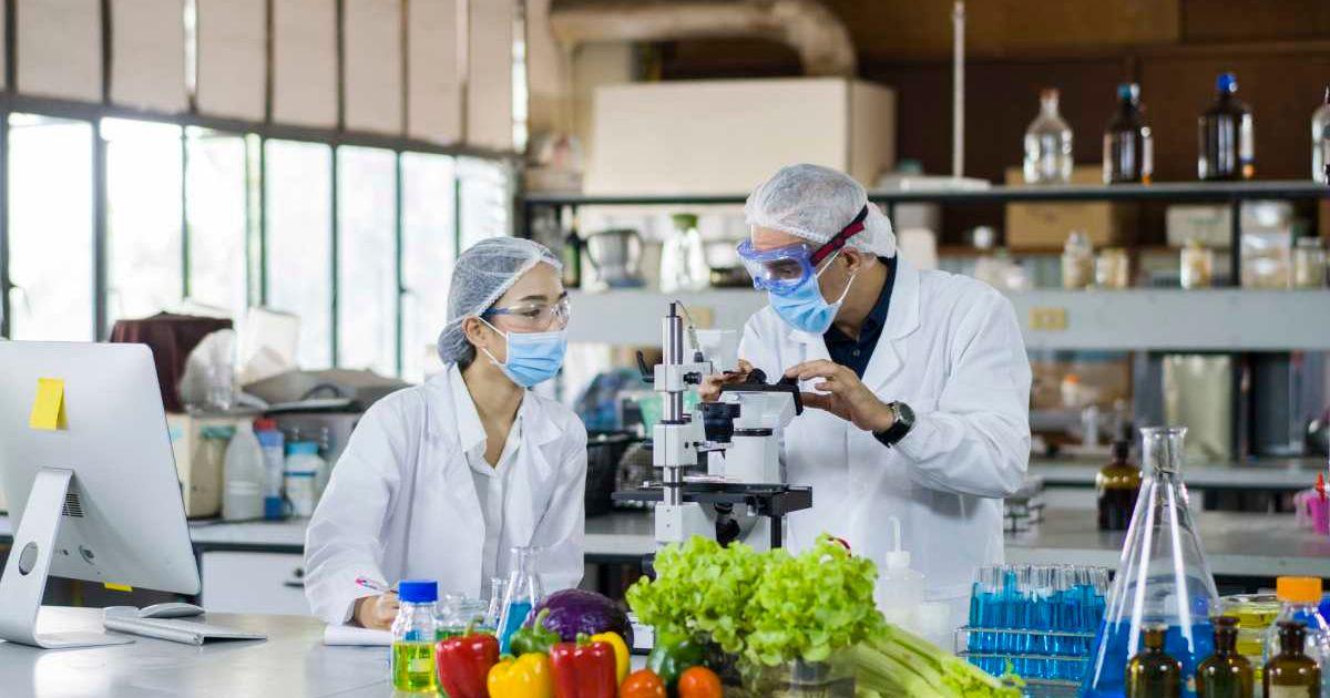 Scientists working in a lab. (Representative Cover Image Source: Getty Images | Thana Prasongsin)