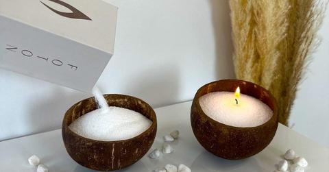 Two coconut bowls filled with pearled candles from Foton