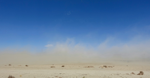 A dust storm rolls across the desert