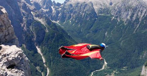A BASE jumper flying mid-air. (Representative Cover Image Source: Getty Images | Oliver Furrer)