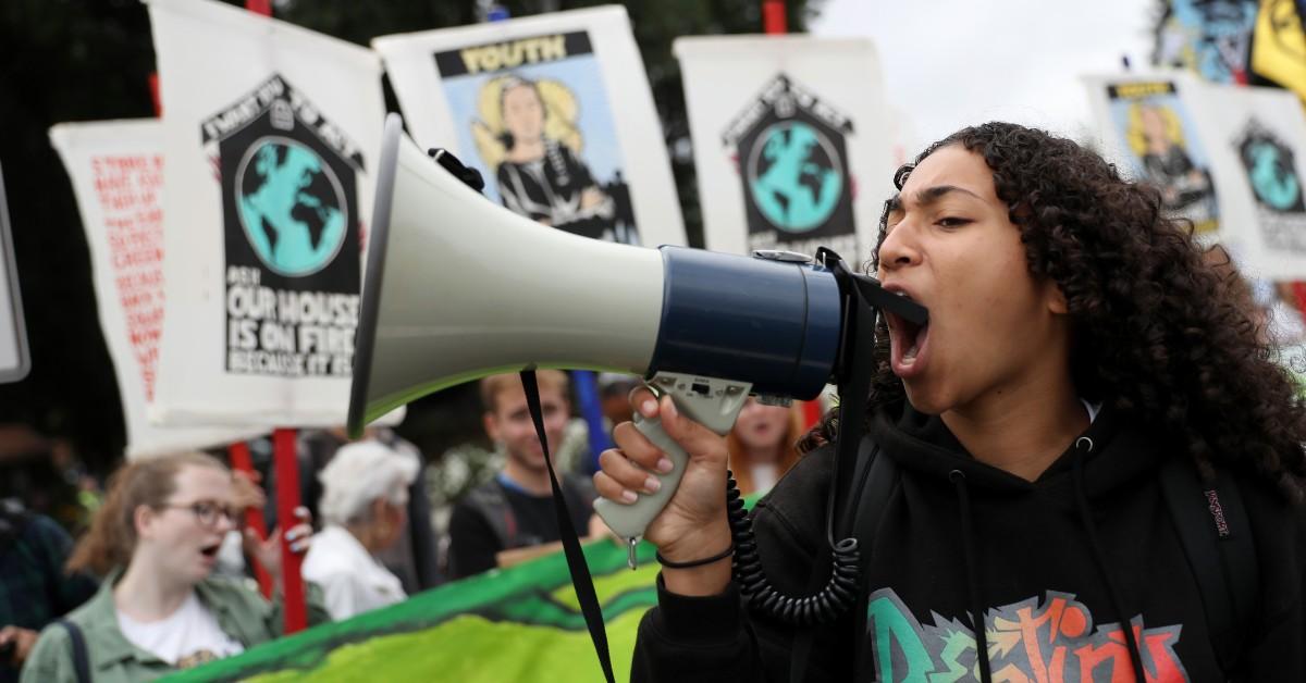 Woman using a bullhorn while protesting