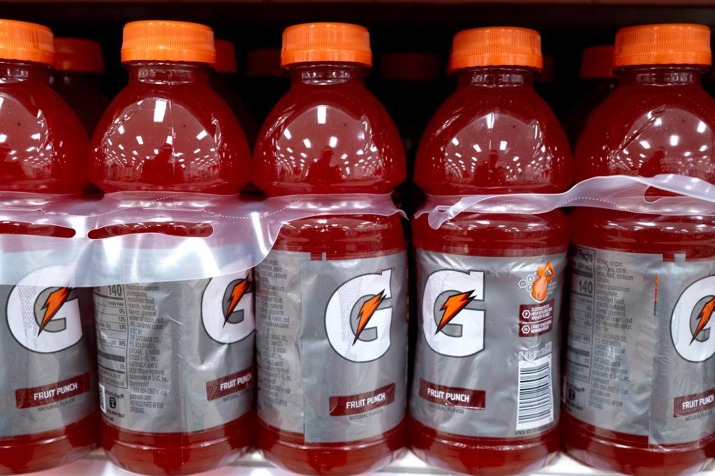 Close up of brand new red Gatorade bottles on a shelf.