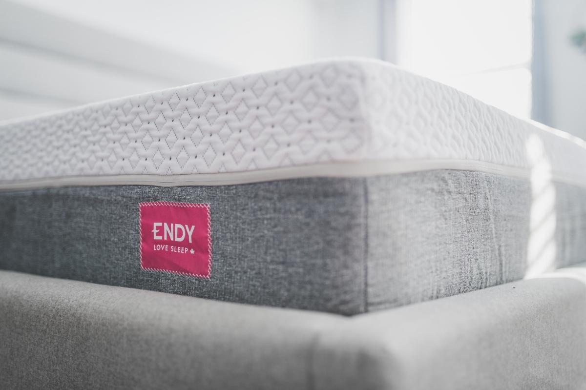 Endy mattress protector in gray and white