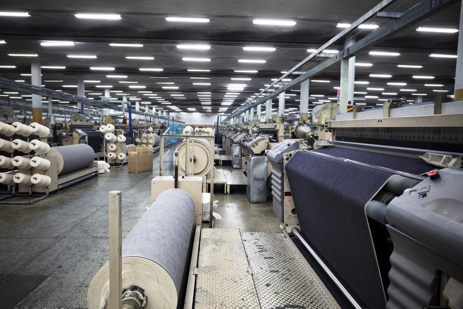 The inside of a denim textile factory.