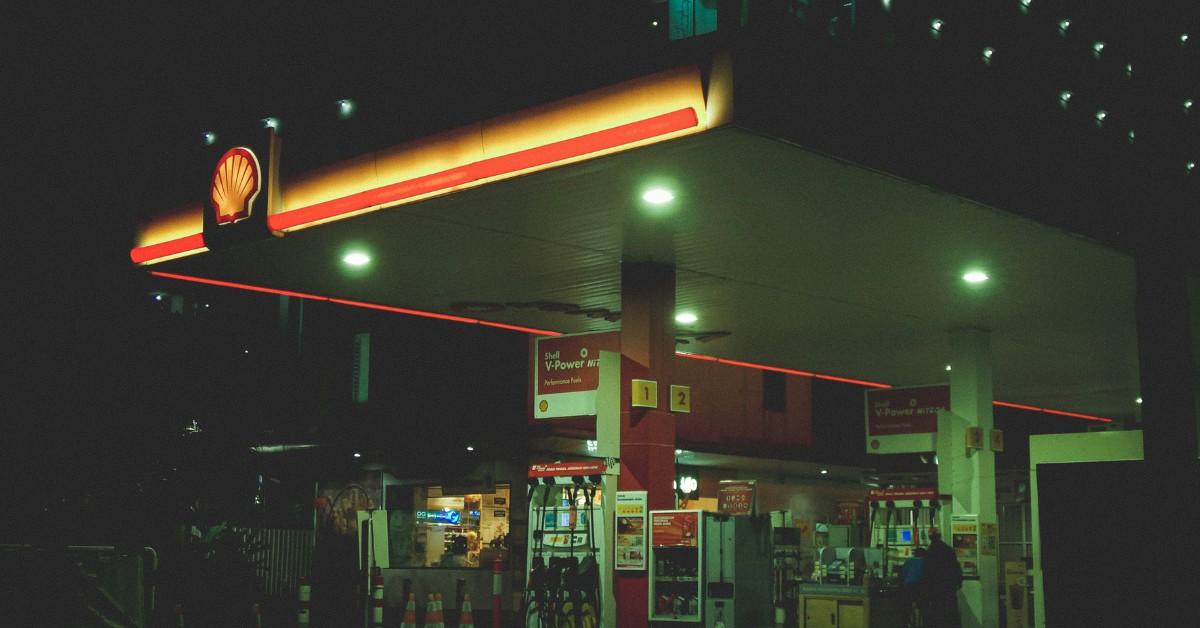 A gas station is lit up at night
