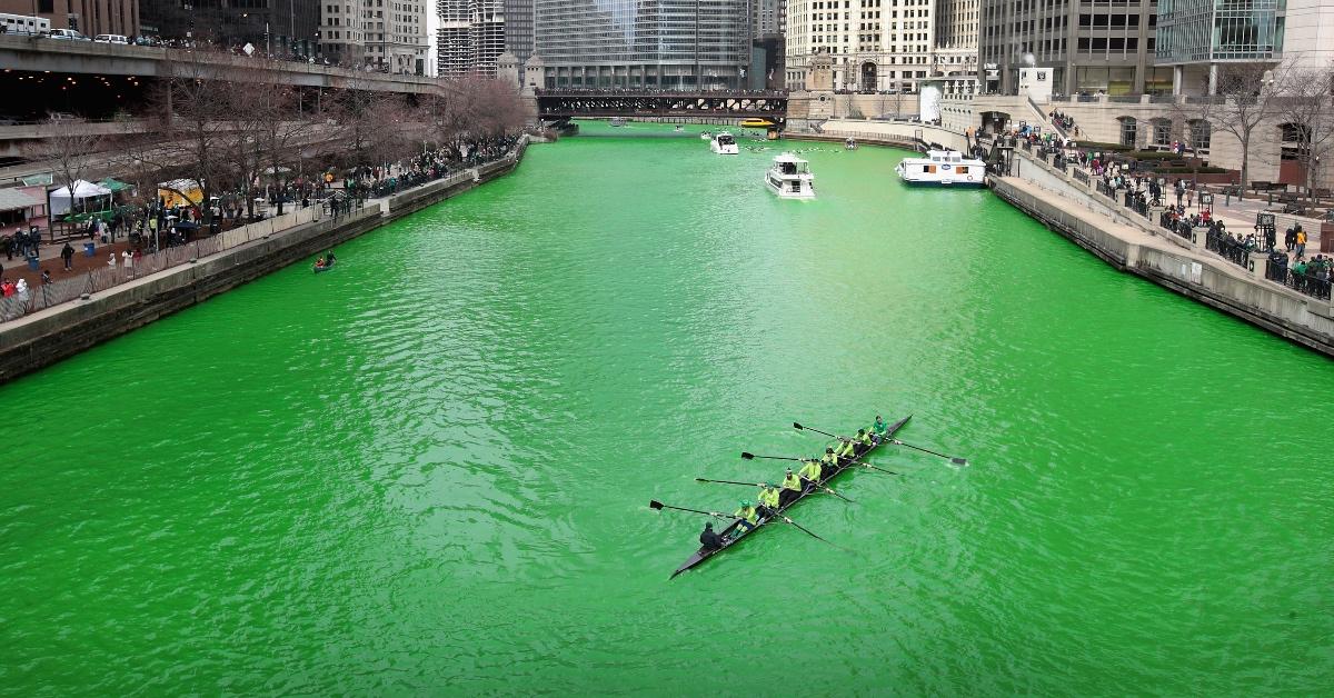 Rowing crew practicing on the Chicago River, which has been dyed green.