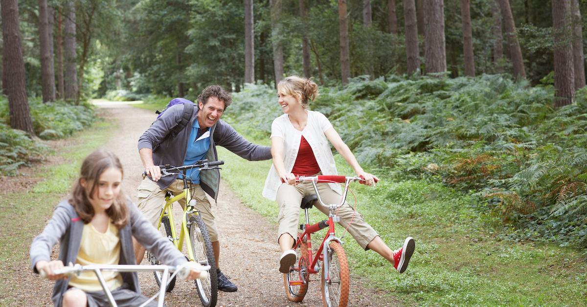 Family Biking in the Forest Laughing