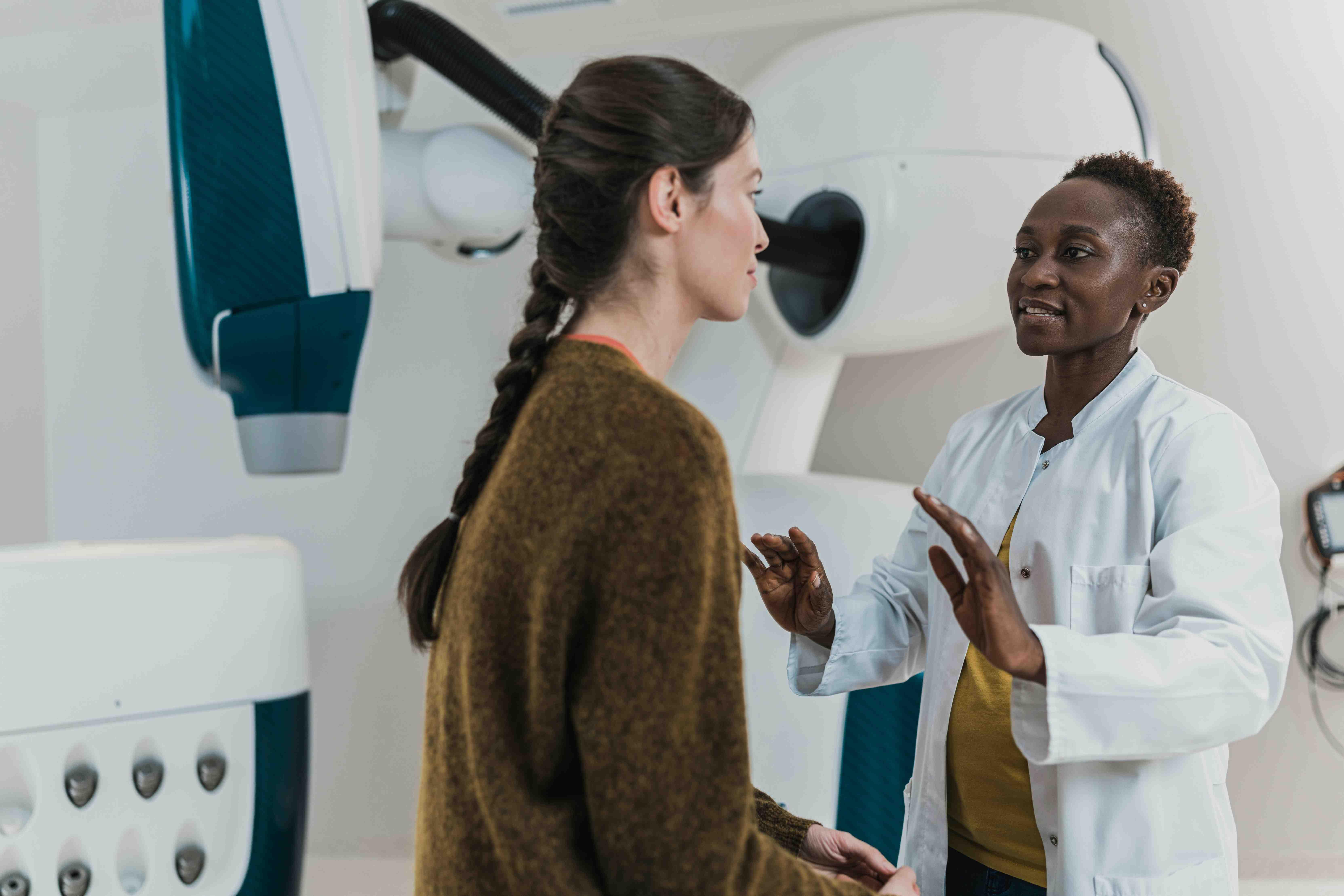 A doctor speaks with a disgruntled patient.