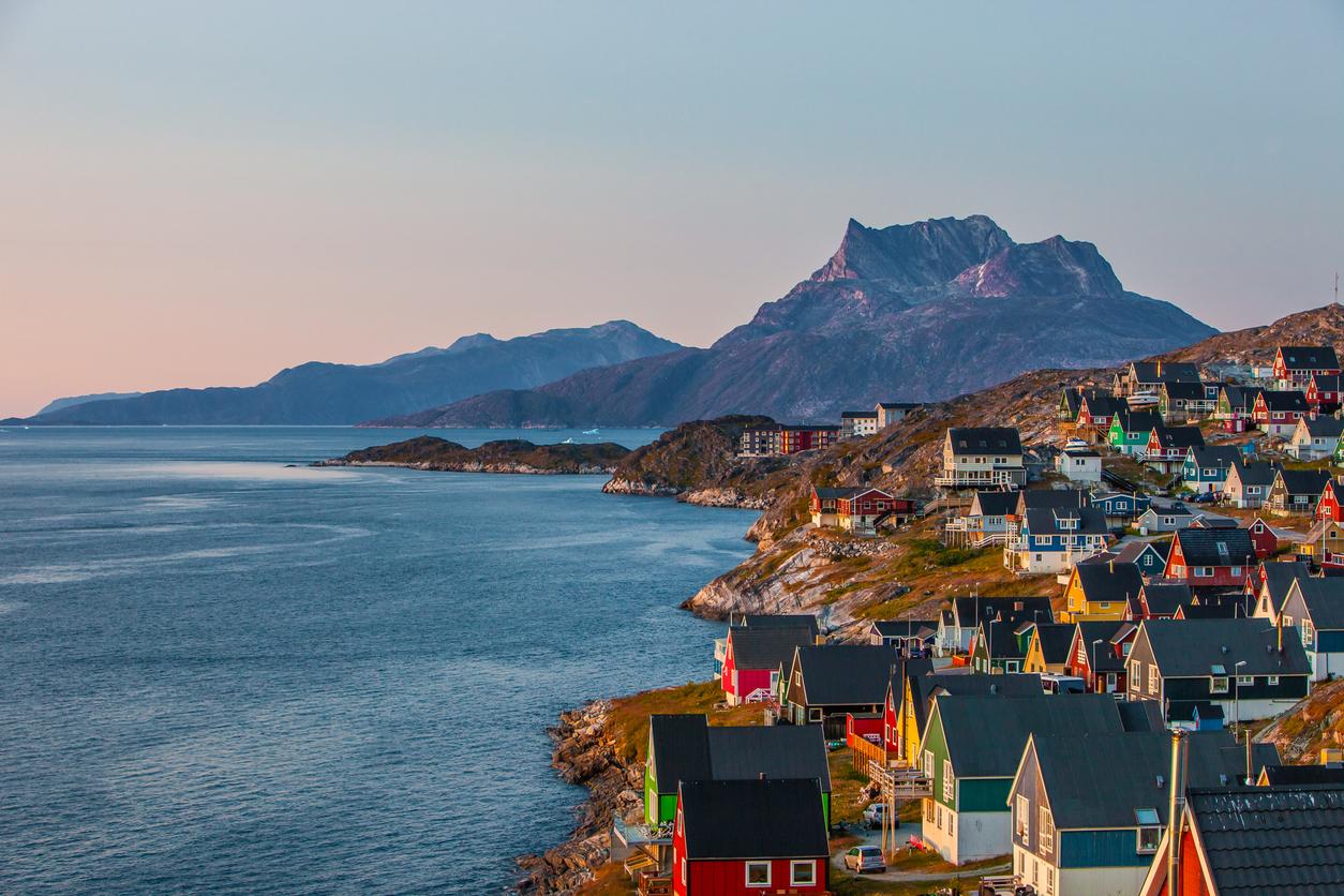 Colorful houses are pictured at sunset in Nuuk, the capital of Greenland.