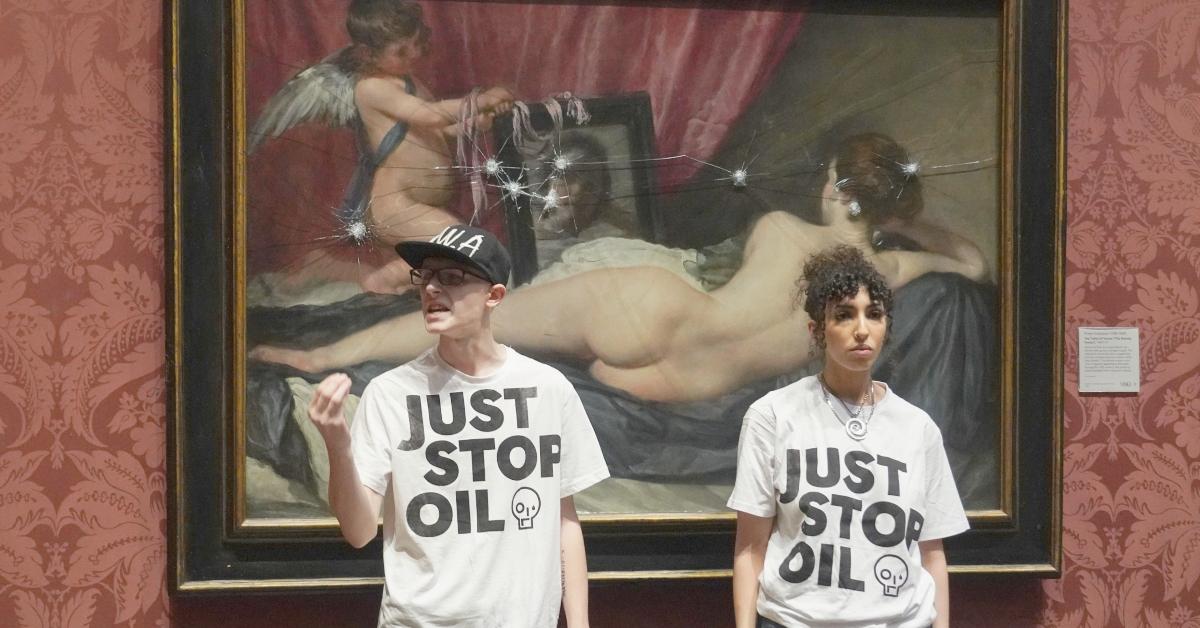 Just Stop Oil protesters in front of the Rokeby Venus painting. 