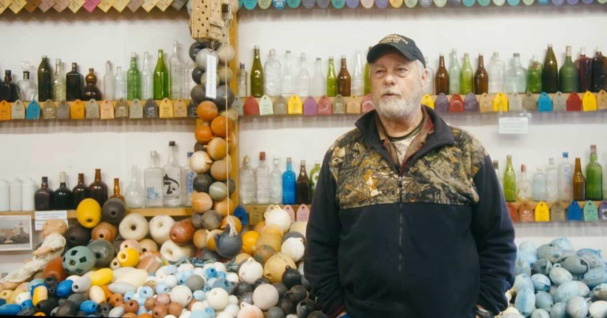 Retired plumber John Anderson at his Beachcombing Museum in Washington. (Cover Image Source: YouTube | @HELP I'M ON FIRE)