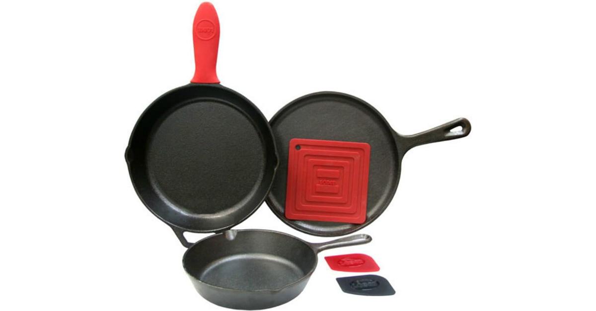 Lodge cast iron skillets with red silicone handles