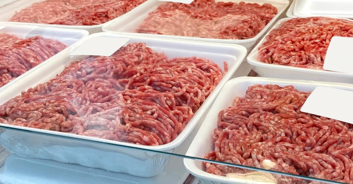 Photograph of packaged ground beef in a supermarket.