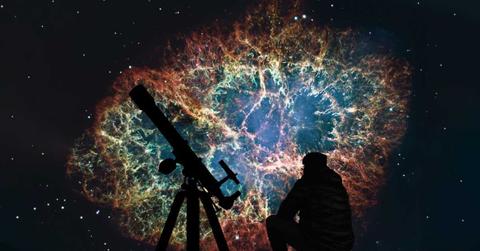 Man with telescope looking at the stars. (Representative Cover Image Source: Getty Images | Allexxandar)