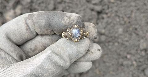 Norwegian archaeologist found a gold sapphire ring entombed seven centimetres deep into the soil (Cover Image Source: Facebook | Norwegian Institute for Cultural Heritage Research)