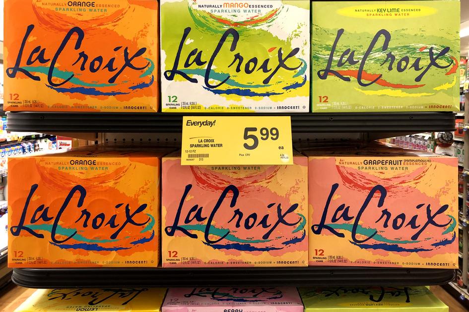 Two shelves of La Croix sparkling water with a yellow price tag of $5.99.