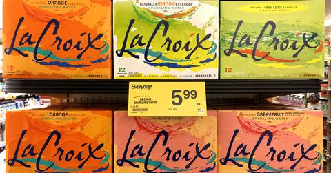 Two shelves of La Croix sparkling water with a yellow price tag of $5.99.