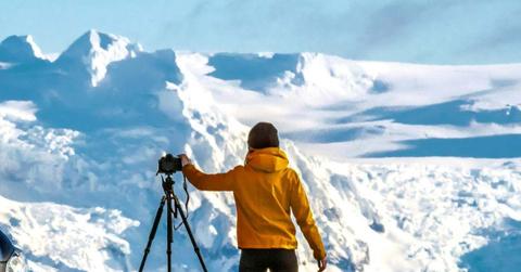 A researcher recording the icy landscape of Antarctica. (Representative Cover Image Source: Pexels | KuKu Campers)