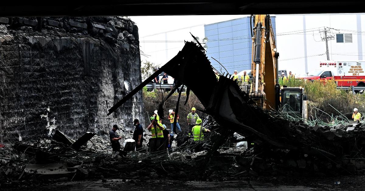 Work crew assessing the damage after I-95 collapse. 