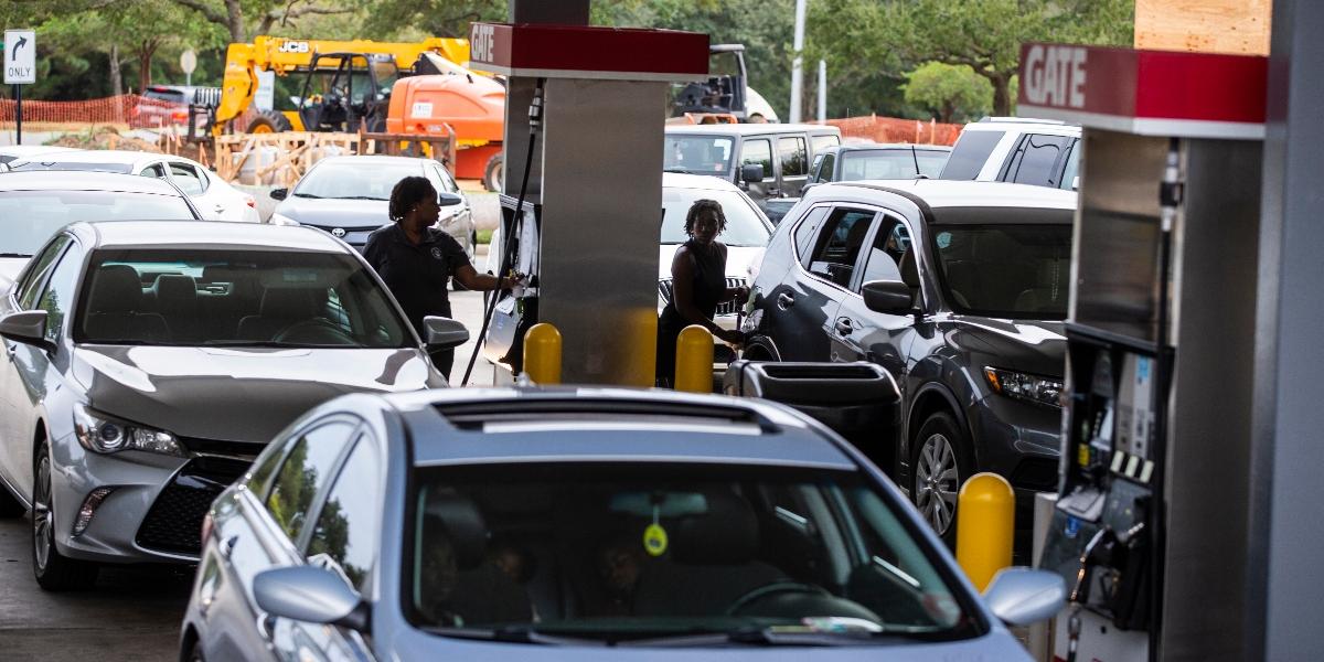 Florida residents gassing up their cars before a hurricane. 