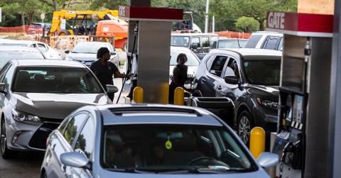 Florida residents gassing up their cars before a hurricane.