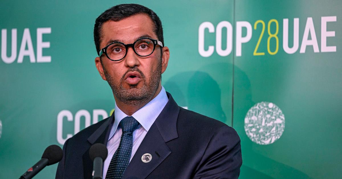 Sultan Al Jaber speaks in front of green COP278 backdrop